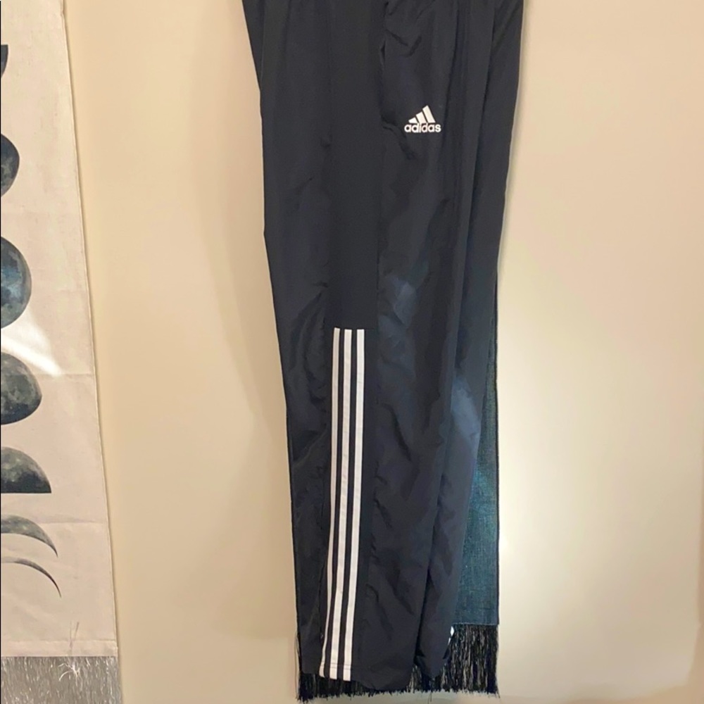 Adidas jogging sweats.